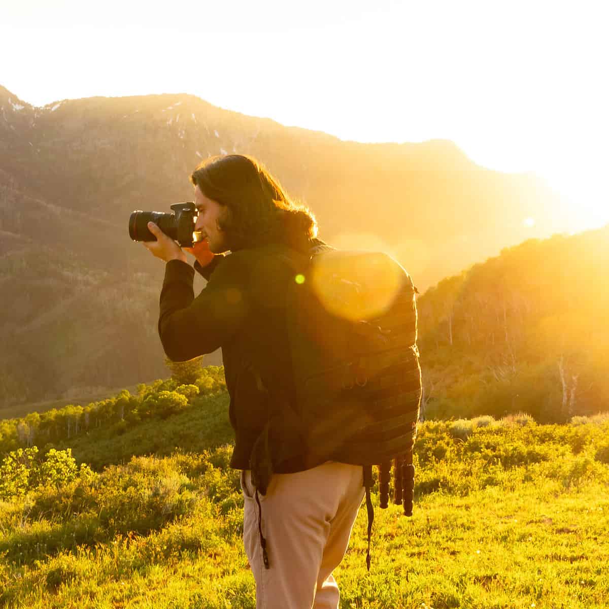 A Photographer shooting a sunset.